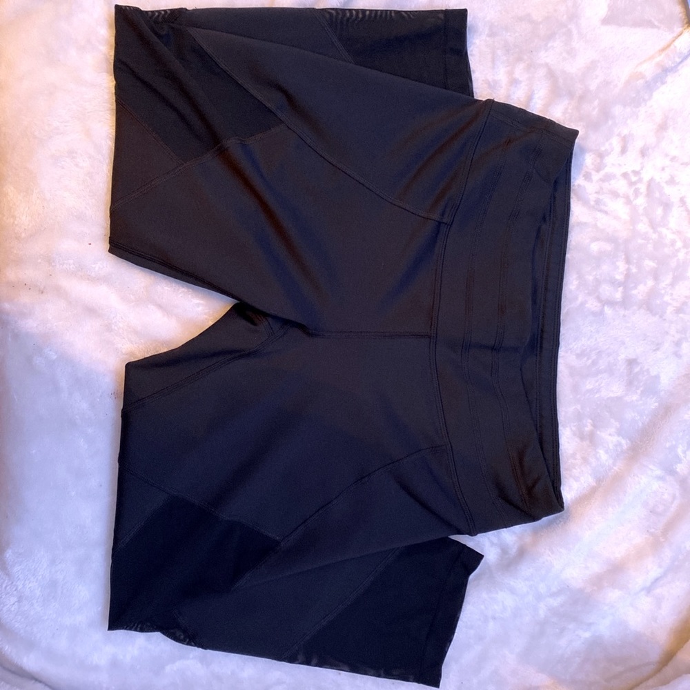 Athela capri black leggings with mesh cutouts